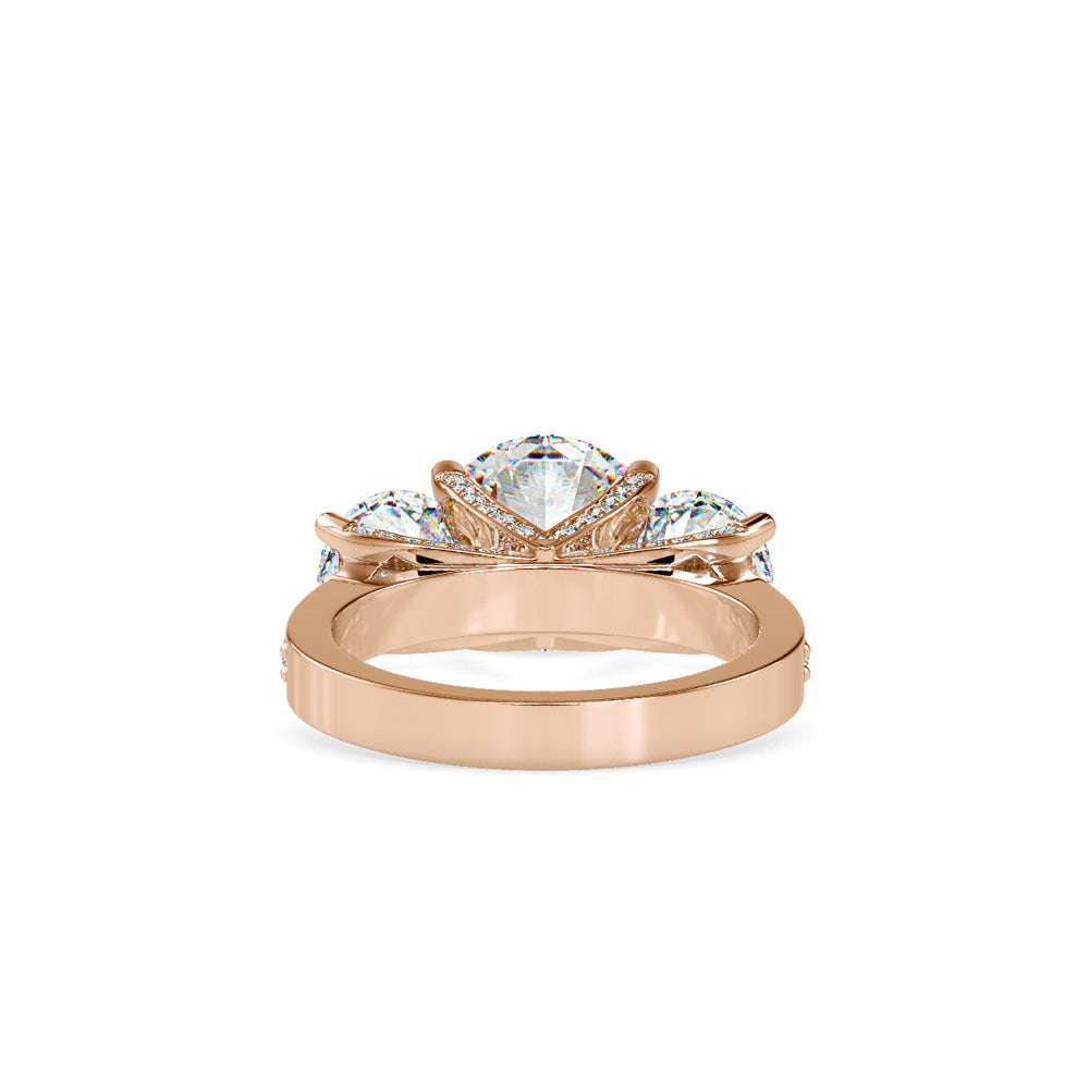 SKU: 0120 (10K) Vintage Triple-Diamond Engagment Ring in Rose Gold.